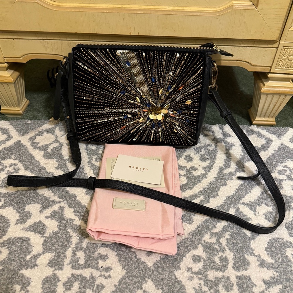 RADLEY LONDON Black and Gold Starburst Crossbody Bag